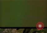 Image of Viet Cong huts bombed Vietnam, 1965, second 1 stock footage video 65675054888