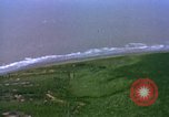 Image of Viet Cong huts bombed Vietnam, 1965, second 29 stock footage video 65675054888