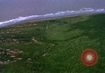 Image of Viet Cong huts bombed Vietnam, 1965, second 31 stock footage video 65675054888