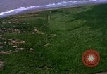 Image of Viet Cong huts bombed Vietnam, 1965, second 32 stock footage video 65675054888