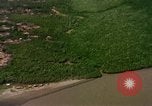 Image of Viet Cong huts bombed Vietnam, 1965, second 34 stock footage video 65675054888
