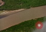 Image of Viet Cong huts bombed Vietnam, 1965, second 37 stock footage video 65675054888