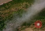 Image of Viet Cong huts bombed Vietnam, 1965, second 44 stock footage video 65675054888