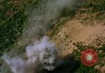 Image of Viet Cong huts bombed Vietnam, 1965, second 49 stock footage video 65675054888