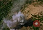 Image of Viet Cong huts bombed Vietnam, 1965, second 50 stock footage video 65675054888