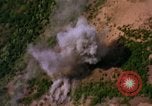 Image of Viet Cong huts bombed Vietnam, 1965, second 52 stock footage video 65675054888