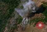 Image of Viet Cong huts bombed Vietnam, 1965, second 54 stock footage video 65675054888
