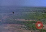 Image of bombardment of Viet Cong huts Vietnam, 1965, second 5 stock footage video 65675054890