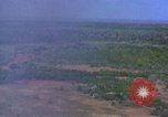 Image of bombardment of Viet Cong huts Vietnam, 1965, second 6 stock footage video 65675054890