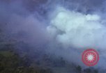 Image of bombardment of Viet Cong huts Vietnam, 1965, second 19 stock footage video 65675054890