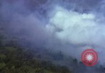 Image of bombardment of Viet Cong huts Vietnam, 1965, second 20 stock footage video 65675054890