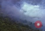 Image of bombardment of Viet Cong huts Vietnam, 1965, second 21 stock footage video 65675054890