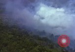Image of bombardment of Viet Cong huts Vietnam, 1965, second 22 stock footage video 65675054890