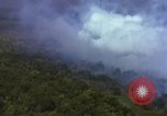 Image of bombardment of Viet Cong huts Vietnam, 1965, second 23 stock footage video 65675054890