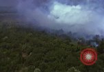 Image of bombardment of Viet Cong huts Vietnam, 1965, second 26 stock footage video 65675054890