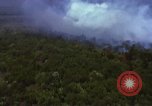 Image of bombardment of Viet Cong huts Vietnam, 1965, second 28 stock footage video 65675054890
