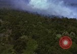 Image of bombardment of Viet Cong huts Vietnam, 1965, second 32 stock footage video 65675054890