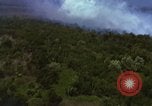 Image of bombardment of Viet Cong huts Vietnam, 1965, second 33 stock footage video 65675054890
