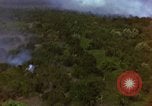 Image of bombardment of Viet Cong huts Vietnam, 1965, second 37 stock footage video 65675054890