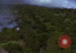 Image of bombardment of Viet Cong huts Vietnam, 1965, second 38 stock footage video 65675054890