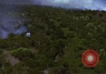Image of bombardment of Viet Cong huts Vietnam, 1965, second 39 stock footage video 65675054890