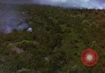 Image of bombardment of Viet Cong huts Vietnam, 1965, second 40 stock footage video 65675054890