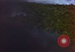 Image of bombardment of Viet Cong huts Vietnam, 1965, second 43 stock footage video 65675054890