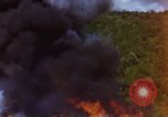 Image of bombardment of Viet Cong huts Vietnam, 1965, second 49 stock footage video 65675054890