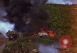 Image of bombardment of Viet Cong huts Vietnam, 1965, second 52 stock footage video 65675054890