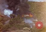 Image of bombardment of Viet Cong huts Vietnam, 1965, second 54 stock footage video 65675054890