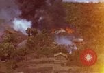 Image of bombardment of Viet Cong huts Vietnam, 1965, second 55 stock footage video 65675054890
