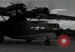 Standbild American Flying Boot New Guinea, 1944, aus Sekunde 45 historischem Filmmaterial Videoclip 65675054891