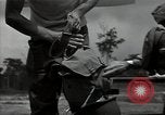 Standbild American Flying Boot New Guinea, 1944, aus Sekunde 55 historischem Filmmaterial Videoclip 65675054891