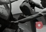 Standbild American Flying Boot New Guinea, 1944, aus Sekunde 58 historischem Filmmaterial Videoclip 65675054891