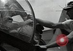 Standbild American Flying Boot New Guinea, 1944, aus Sekunde 59 historischem Filmmaterial Videoclip 65675054891