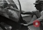 Standbild American Flying Boot New Guinea, 1944, aus Sekunde 61 historischem Filmmaterial Videoclip 65675054891