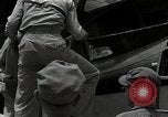 Standbild American Flying Boot New Guinea, 1944, aus Sekunde 62 historischem Filmmaterial Videoclip 65675054891