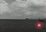 Standbild C-47 Skytrain Flugzeuge Camp Keithley Mindanao Philippinen, 1945, aus Sekunde 55 historischem Filmmaterial Videoclip 65675054897