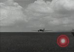 Standbild C-47 Skytrain Flugzeuge Camp Keithley Mindanao Philippinen, 1945, aus Sekunde 57 historischem Filmmaterial Videoclip 65675054897