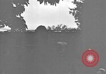 Image of civilians moved to build air base Okinawa Ryukyu Islands, 1945, second 15 stock footage video 65675054926