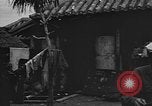 Image of civilians moved to build air base Okinawa Ryukyu Islands, 1945, second 41 stock footage video 65675054926