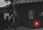 Image of civilians moved to build air base Okinawa Ryukyu Islands, 1945, second 42 stock footage video 65675054926