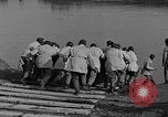 Image of Italian soldiers build pontoon bridge Italy, 1930, second 37 stock footage video 65675054983