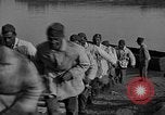 Image of Italian soldiers build pontoon bridge Italy, 1930, second 42 stock footage video 65675054983