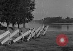 Image of Italian soldiers build pontoon bridge Italy, 1930, second 46 stock footage video 65675054983