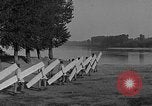 Image of Italian soldiers build pontoon bridge Italy, 1930, second 47 stock footage video 65675054983