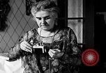 Image of Mother Katherine Larke miniature doll house San Francisco California USA, 1930, second 12 stock footage video 65675054984