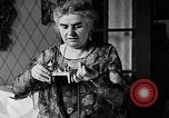 Image of Mother Katherine Larke miniature doll house San Francisco California USA, 1930, second 13 stock footage video 65675054984