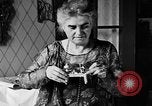 Image of Mother Katherine Larke miniature doll house San Francisco California USA, 1930, second 15 stock footage video 65675054984
