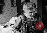 Image of Mother Katherine Larke miniature doll house San Francisco California USA, 1930, second 18 stock footage video 65675054984